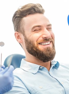 Man smiling at dentist office