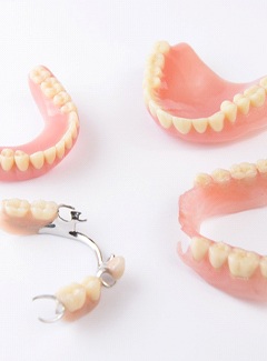 Set of full and partial dentures in Topeka & Silver Lake, KS on table