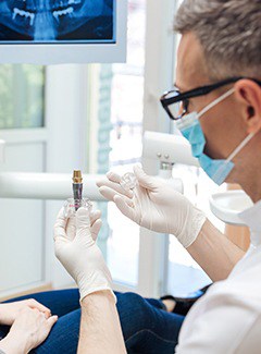 Topeka implant dentist explaining how dental implants work