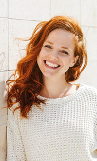 Woman smiling outside