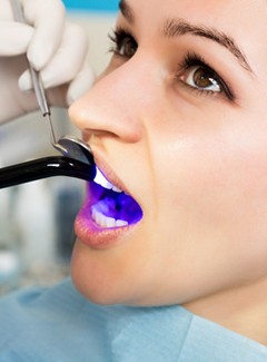Woman undergoing dental bonding 