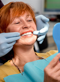 Silver Lake implant dentist talking with patient
