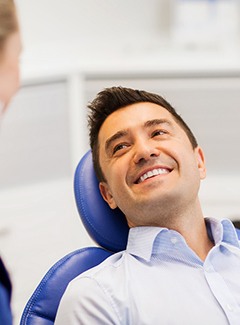 Man smiling in dental chair