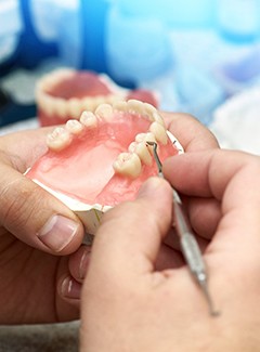 technician making dentures 