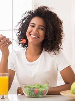 woman eating a salad 