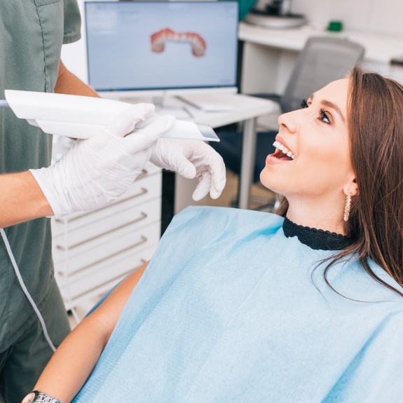 smiling woman in dentist chair