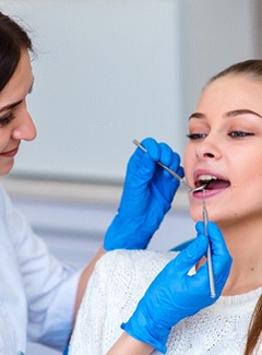 A young woman in the dentist chair