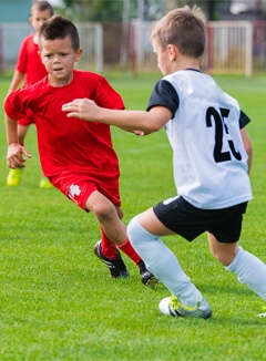 Boys playing soccer 