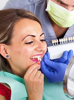 woman trying on veneers in Topeka & Silver Lake 