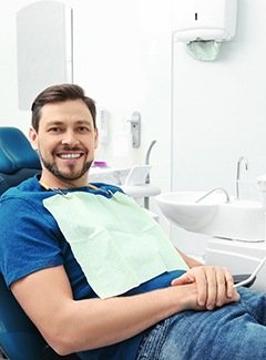 Man smiling after root canal therapy in Topeka & Silver Lake