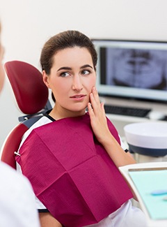 Emergency dentist in Topeka and Silver Lake speaking with patient