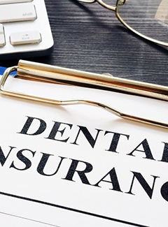Dental insurance form resting on a table