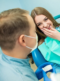 Patient learning about sedation dentistry in Topeka and Silver Lake