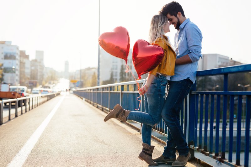 Couple with good oral health smiling on Valentine’s Day