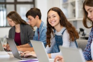 Woman smiling while in her class